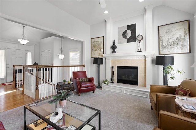 11518 W 143rd Ter, Olathe, KS 66062 - living area with a tile fireplace, a ceiling fan, recessed lighting, and vaulted ceiling