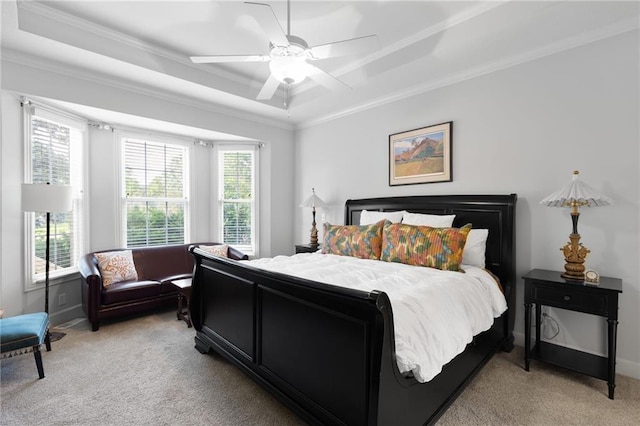 11518 W 143rd Ter, Olathe, KS 66062 - bedroom with a tray ceiling, light carpet, multiple windows, and crown molding