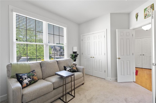 11518 W 143rd Ter, Olathe, KS 66062 - sitting room with healthy amount of natural light and light colored carpet