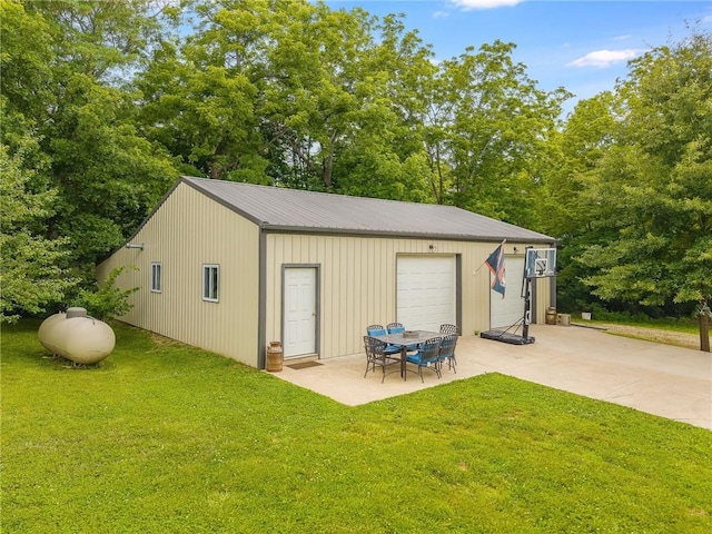 5488 SW Reed Ln, Trimble, MO 64492 - detached garage featuring view of wooded area