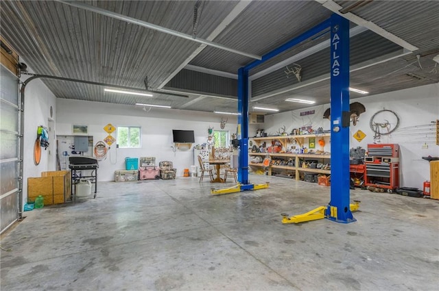 5488 SW Reed Ln, Trimble, MO 64492 - garage with a workshop area