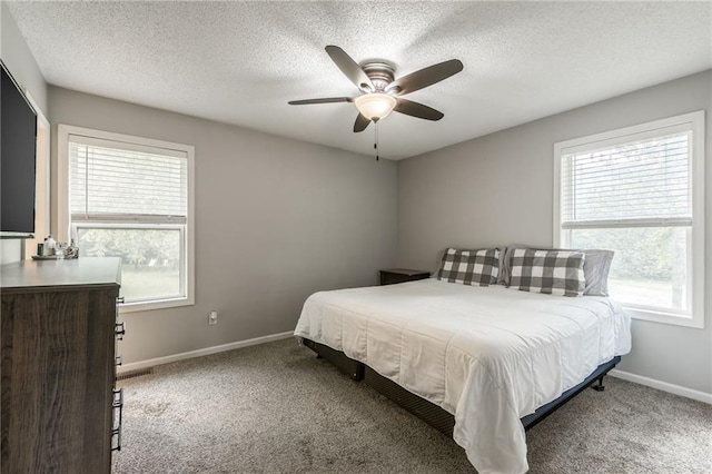 5488 SW Reed Ln, Trimble, MO 64492 - carpeted bedroom featuring a textured ceiling and a ceiling fan