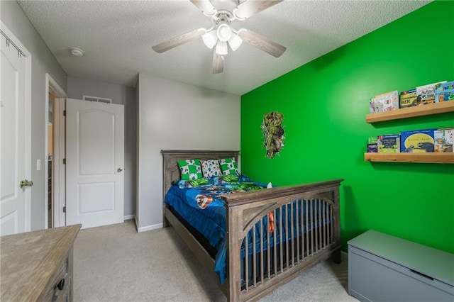 5488 SW Reed Ln, Trimble, MO 64492 - bedroom featuring carpet, a textured ceiling, and a ceiling fan