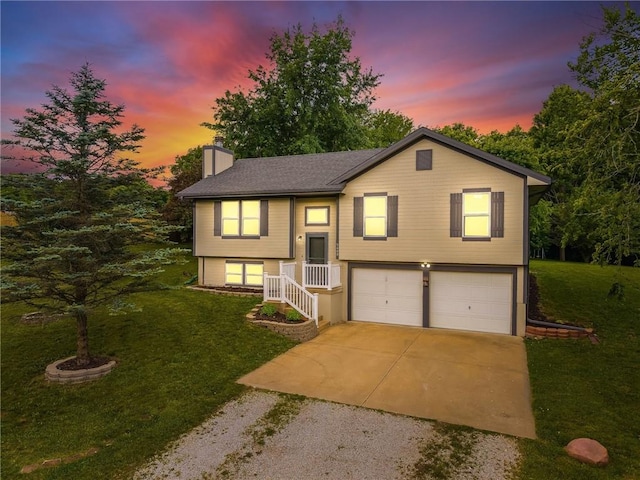 5488 SW Reed Ln, Trimble, MO 64492 - split foyer home featuring gravel driveway, a chimney, a garage, and a yard