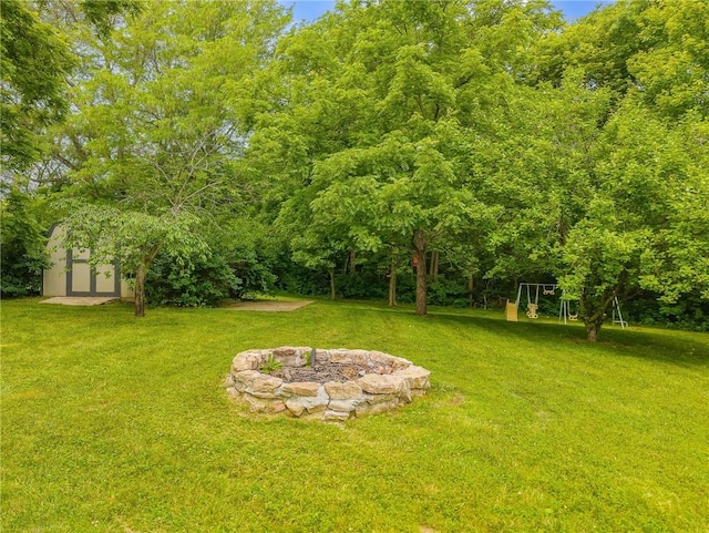 5488 SW Reed Ln, Trimble, MO 64492 - view of green lawn featuring an outdoor structure