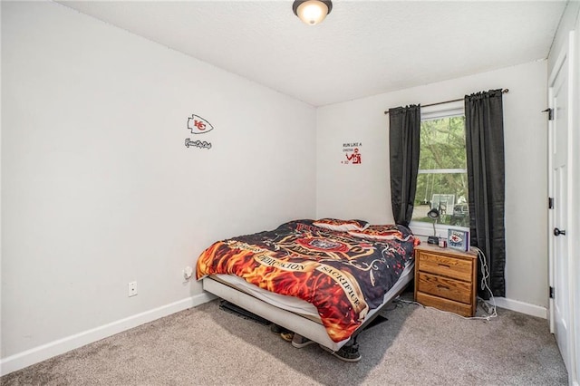 504 W 5th Ct, Peculiar, MO 64078 - bedroom featuring baseboards and carpet floors