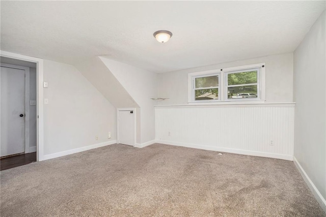 504 W 5th Ct, Peculiar, MO 64078 - additional living space featuring carpet floors and baseboards