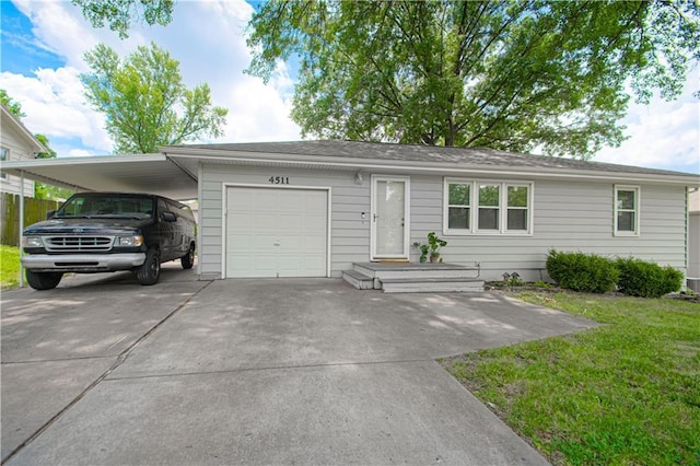 4511 NE 45th St, Kansas City, MO 64117 - ranch-style home with driveway, a front yard, a garage, and an attached carport