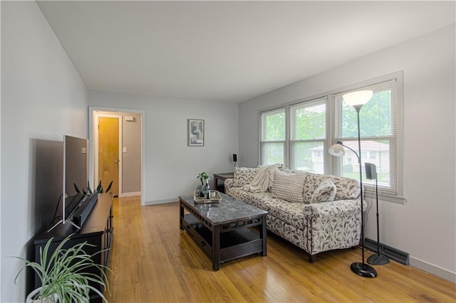 4511 NE 45th St, Kansas City, MO 64117 - living room with light wood-style flooring and baseboards
