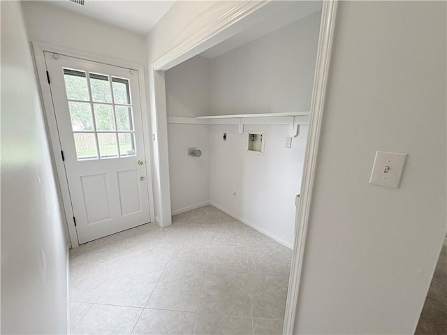 3647 NW Blue Jacket Dr, Lees Summit, MO 64064 - laundry area with hookup for an electric dryer, hookup for a washing machine, and light tile patterned flooring
