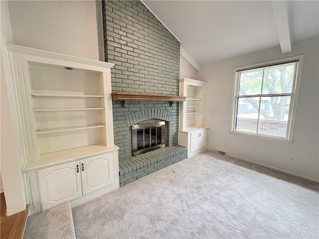 3647 NW Blue Jacket Dr, Lees Summit, MO 64064 - unfurnished living room with a brick fireplace and carpet flooring