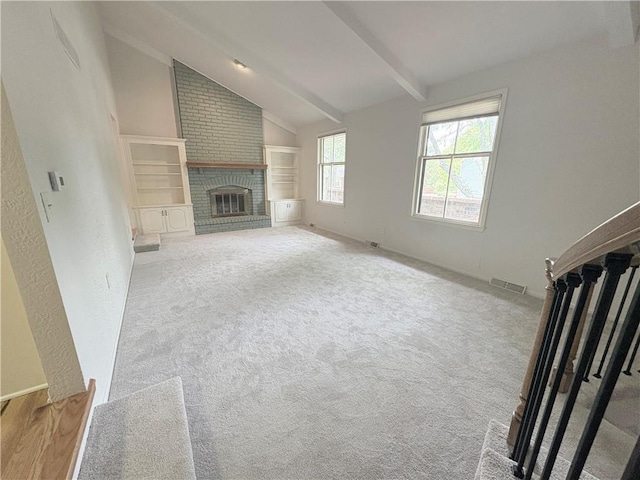 3647 NW Blue Jacket Dr, Lees Summit, MO 64064 - unfurnished living room featuring a fireplace and carpet