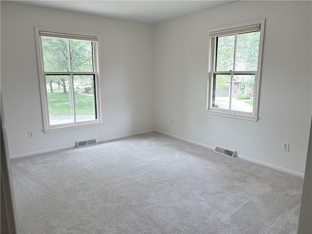 3647 NW Blue Jacket Dr, Lees Summit, MO 64064 - carpeted spare room featuring healthy amount of natural light