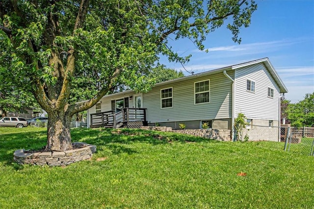 7314 NW 84th Ter, Kansas City, MO 64153 - ranch-style house with a deck