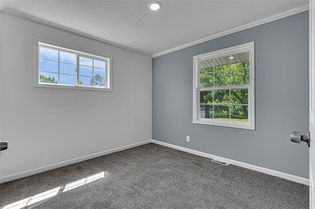 7314 NW 84th Ter, Kansas City, MO 64153 - carpeted spare room with ornamental molding, healthy amount of natural light, a textured ceiling, and baseboards