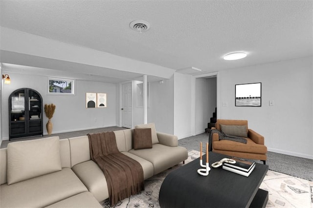 7314 NW 84th Ter, Kansas City, MO 64153 - carpeted living area with a textured ceiling, stairs, and baseboards