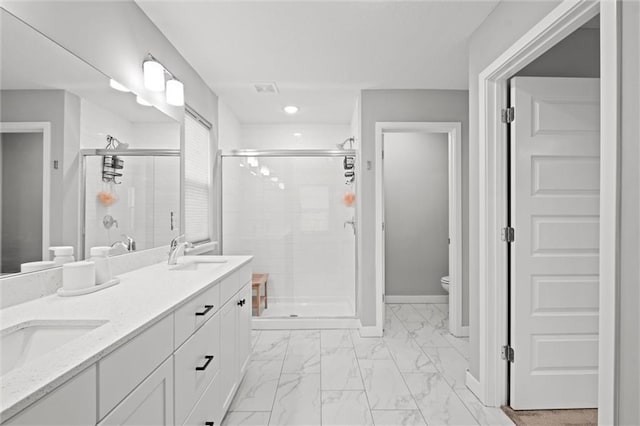 8810 SW 9th Ter, Blue Springs, MO 64064 - full bath with marble look tile flooring, a shower stall, double vanity, and recessed lighting