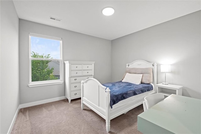 8810 SW 9th Ter, Blue Springs, MO 64064 - carpeted bedroom featuring baseboards