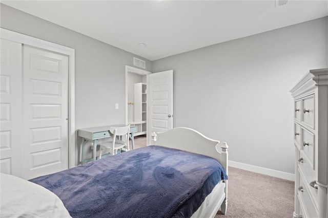 8810 SW 9th Ter, Blue Springs, MO 64064 - carpeted bedroom featuring baseboards