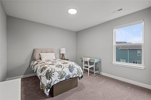 8810 SW 9th Ter, Blue Springs, MO 64064 - carpeted bedroom featuring baseboards