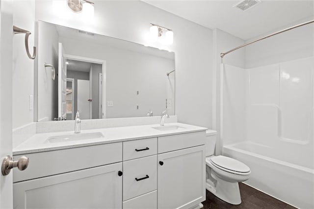 8810 SW 9th Ter, Blue Springs, MO 64064 - bathroom featuring double vanity and shower / washtub combination