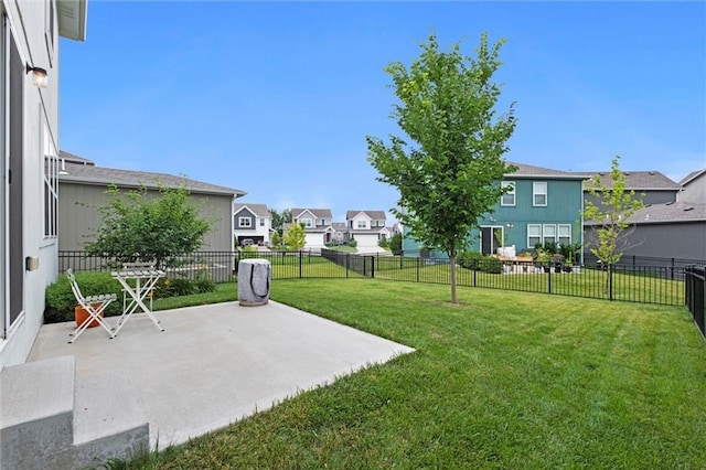 8810 SW 9th Ter, Blue Springs, MO 64064 - fenced backyard featuring a residential view and a patio area