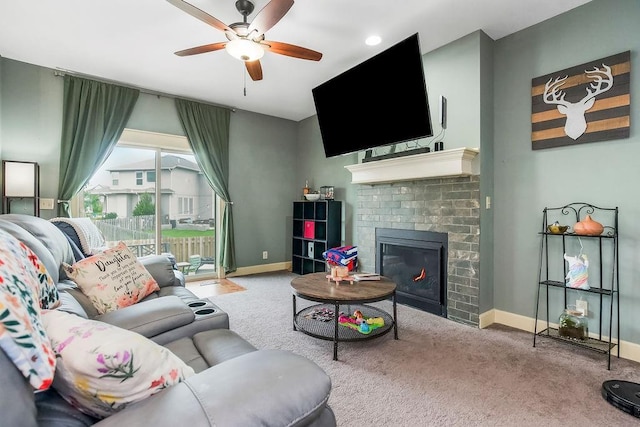 28340 W 164th St, Gardner, KS 66030 - carpeted living room featuring a ceiling fan, a brick fireplace, and baseboards