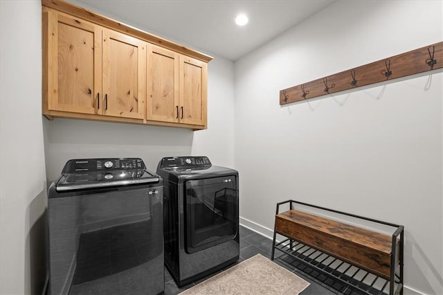 306 SW 17th St, Oak Grove, MO 64075 - laundry room featuring washer and clothes dryer, cabinet space, recessed lighting, and dark tile patterned flooring