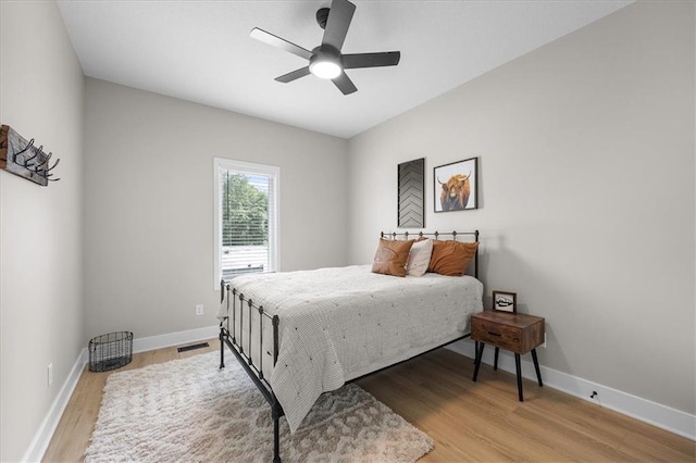 306 SW 17th St, Oak Grove, MO 64075 - bedroom featuring wood finished floors and a ceiling fan