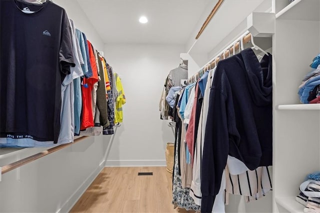 306 SW 17th St, Oak Grove, MO 64075 - walk in closet featuring wood finished floors