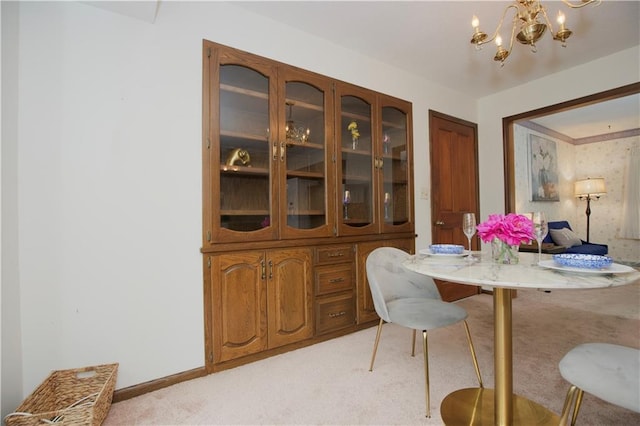 13408 Winchester Ave, Grandview, MO 64030 - dining area featuring light carpet and a chandelier