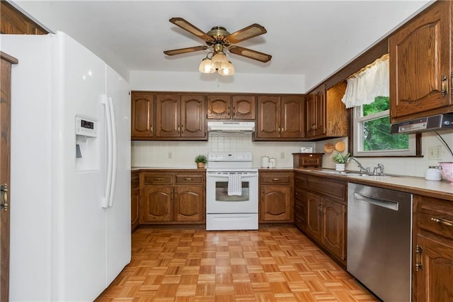 13408 Winchester Ave, Grandview, MO 64030 - kitchen featuring white appliances, under cabinet range hood, a sink, a ceiling fan, and decorative backsplash