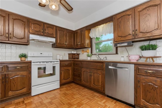 13408 Winchester Ave, Grandview, MO 64030 - kitchen featuring electric stove, stainless steel dishwasher, under cabinet range hood, ceiling fan, and backsplash