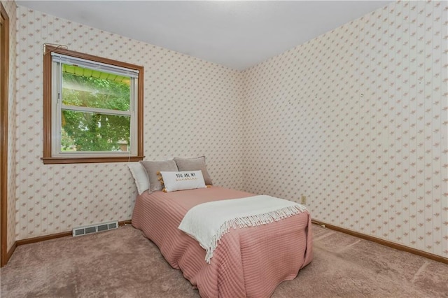 13408 Winchester Ave, Grandview, MO 64030 - carpeted bedroom featuring wallpapered walls and baseboards