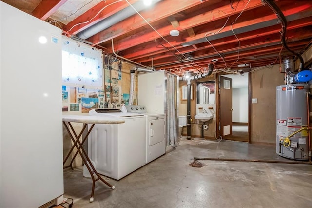 13408 Winchester Ave, Grandview, MO 64030 - unfinished below grade area featuring gas water heater and washing machine and dryer