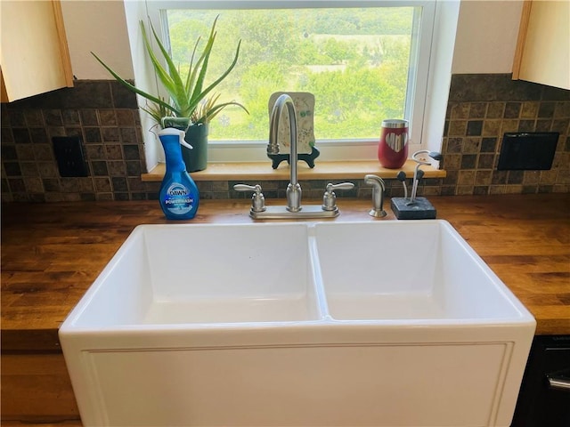 31821 159th St, Leavenworth, KS 66048 - kitchen view of decorative backsplash and white cabinets