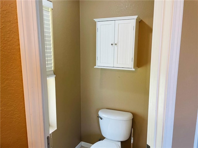 31821 159th St, Leavenworth, KS 66048 - bathroom with toilet and a textured wall