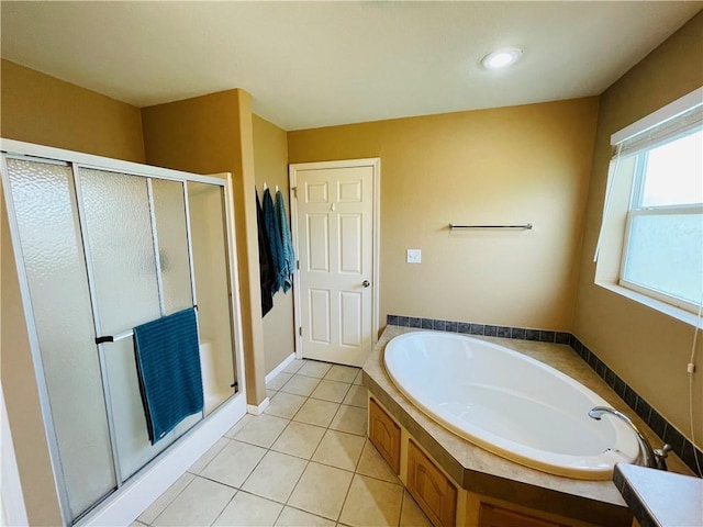 31821 159th St, Leavenworth, KS 66048 - full bath featuring a shower stall, a bath, tile patterned flooring, and recessed lighting