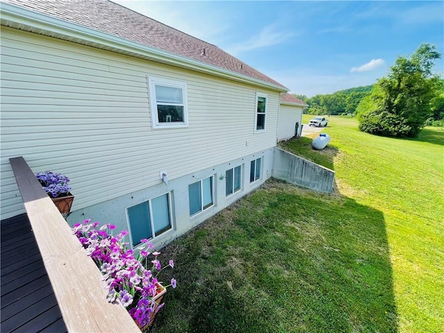 31821 159th St, Leavenworth, KS 66048 - view of property exterior featuring a lawn and roof with shingles