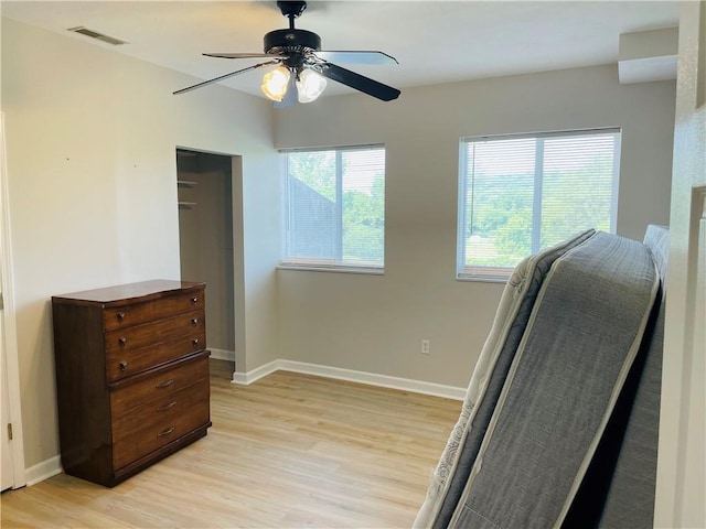 31821 159th St, Leavenworth, KS 66048 - bedroom with light wood-style flooring and ceiling fan