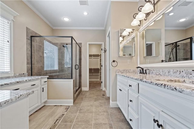 15027 Ash St, Leawood, KS 66224 - full bath featuring a stall shower, vanity, ornamental molding, a spacious closet, and recessed lighting