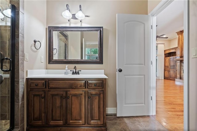 15027 Ash St, Leawood, KS 66224 - bathroom with vanity and tiled shower