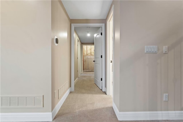 15027 Ash St, Leawood, KS 66224 - corridor featuring carpet floors and baseboards