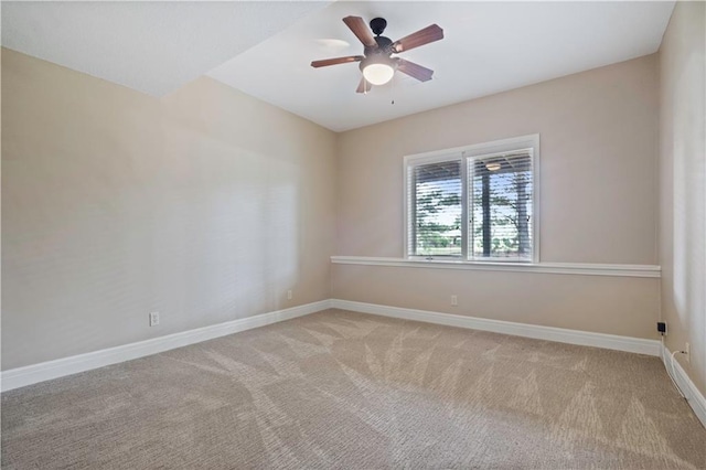 15027 Ash St, Leawood, KS 66224 - empty room with light carpet and ceiling fan