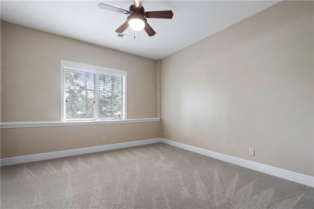 15027 Ash St, Leawood, KS 66224 - empty room featuring carpet floors and a ceiling fan