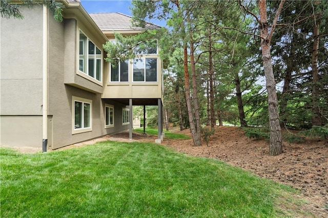 15027 Ash St, Leawood, KS 66224 - view of green lawn with a sunroom
