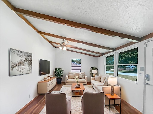 2939 Jewett St, Kansas City, MO 64117 - living room with wood finished floors, ceiling fan, and baseboards