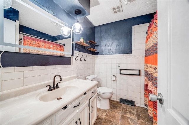 160 SW 131st Hwy, Holden, MO 64040 - bathroom with vanity, tile walls, stone finish flooring, and a shower with curtain
