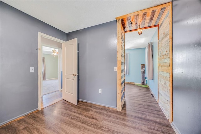 160 SW 131st Hwy, Holden, MO 64040 - hallway featuring wood finished floors and baseboards