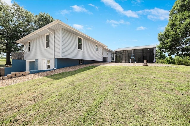 160 SW 131st Hwy, Holden, MO 64040 - back of house featuring a lawn